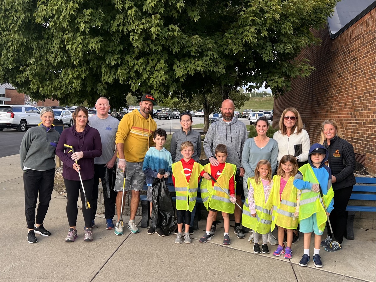 Volunteers pose for a photo at adopt-a-roadway event at Mercer