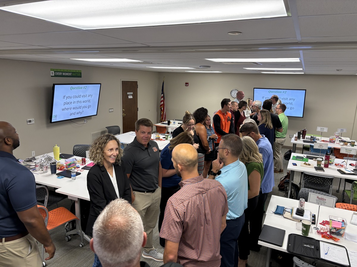 district leaders chat during conversational warm-up exercises