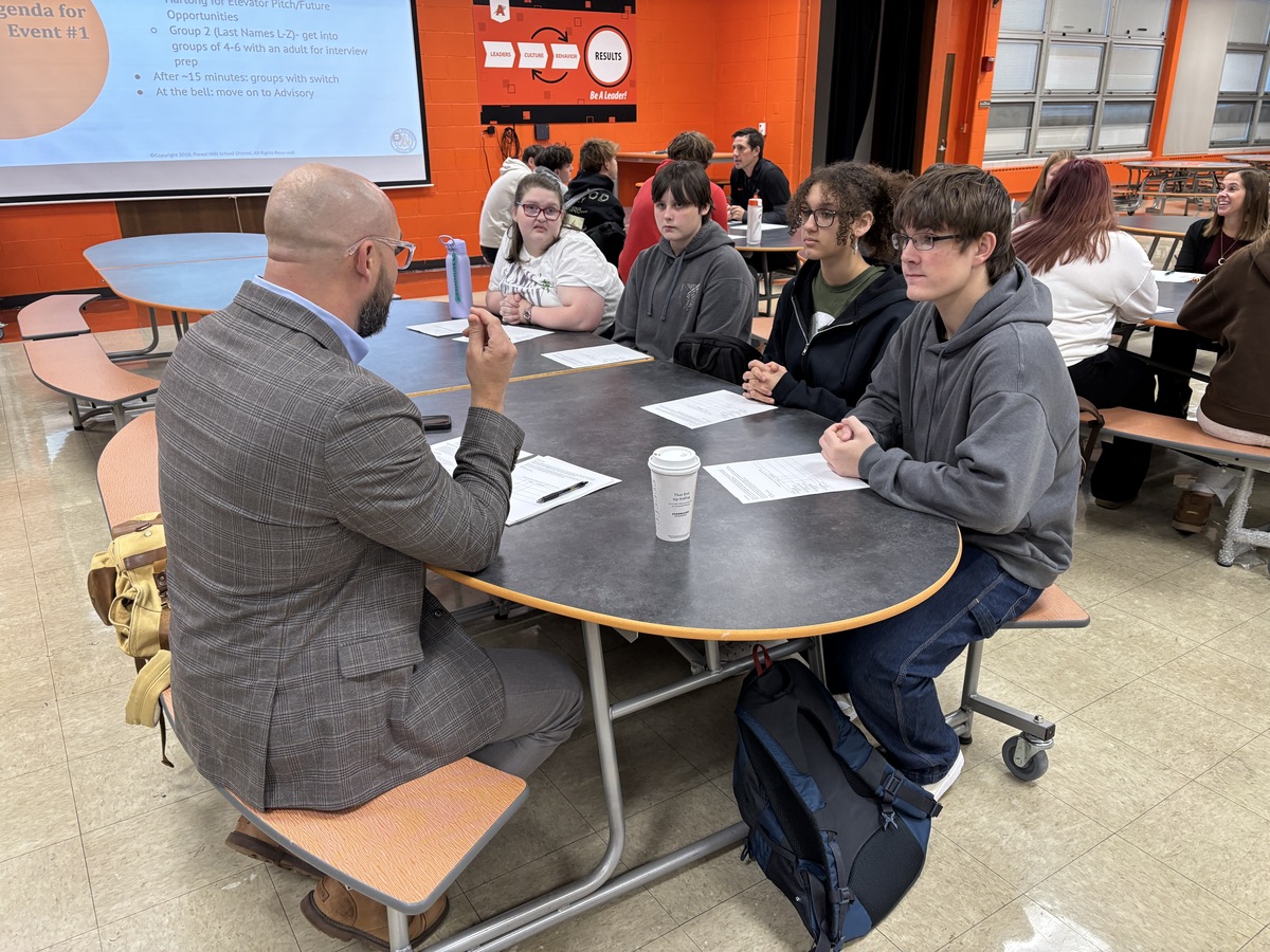 students participate in a mock interview event at Anderson High School