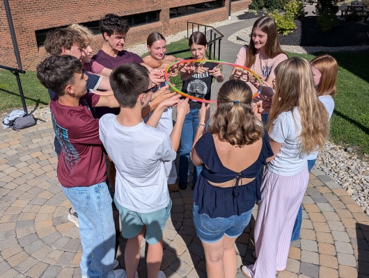 Turpin and Gymnasium im Schloss students participate in a team building activity after their first day at Turpin.