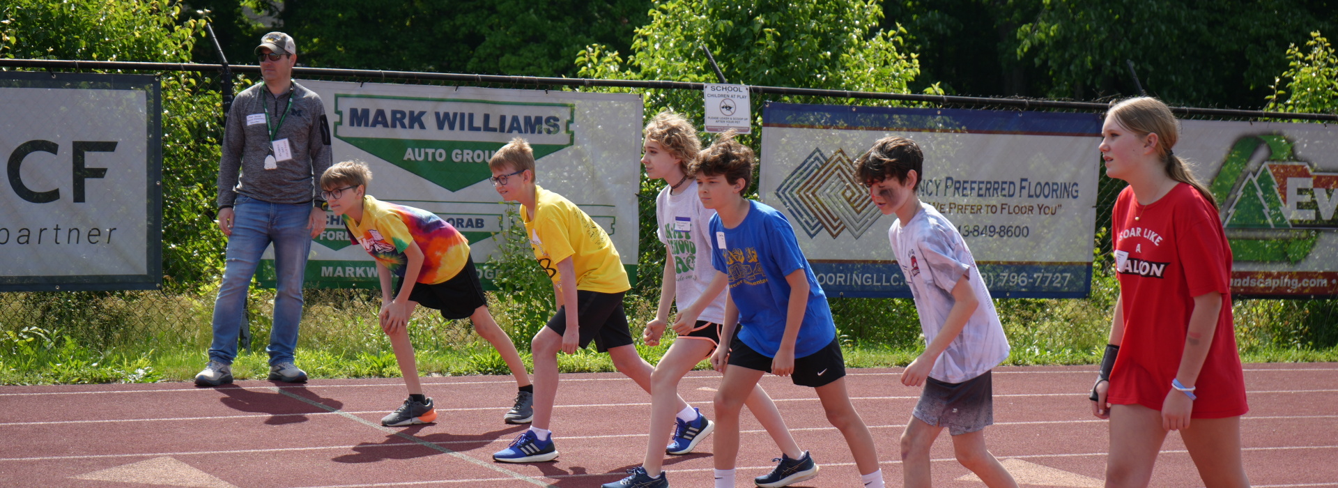 students line up on the starting line for a race