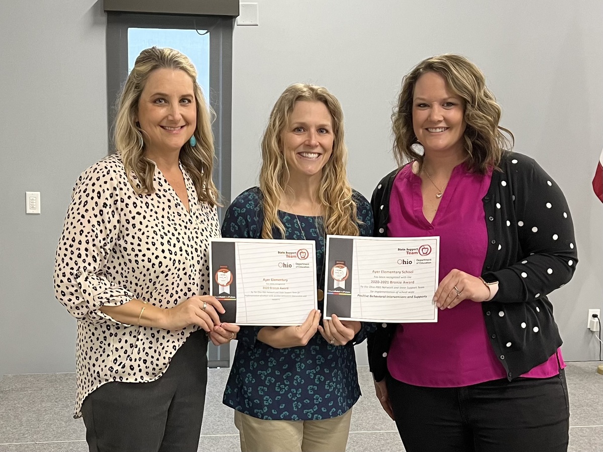 PBIS Group of 3 woman smiling holding certificates